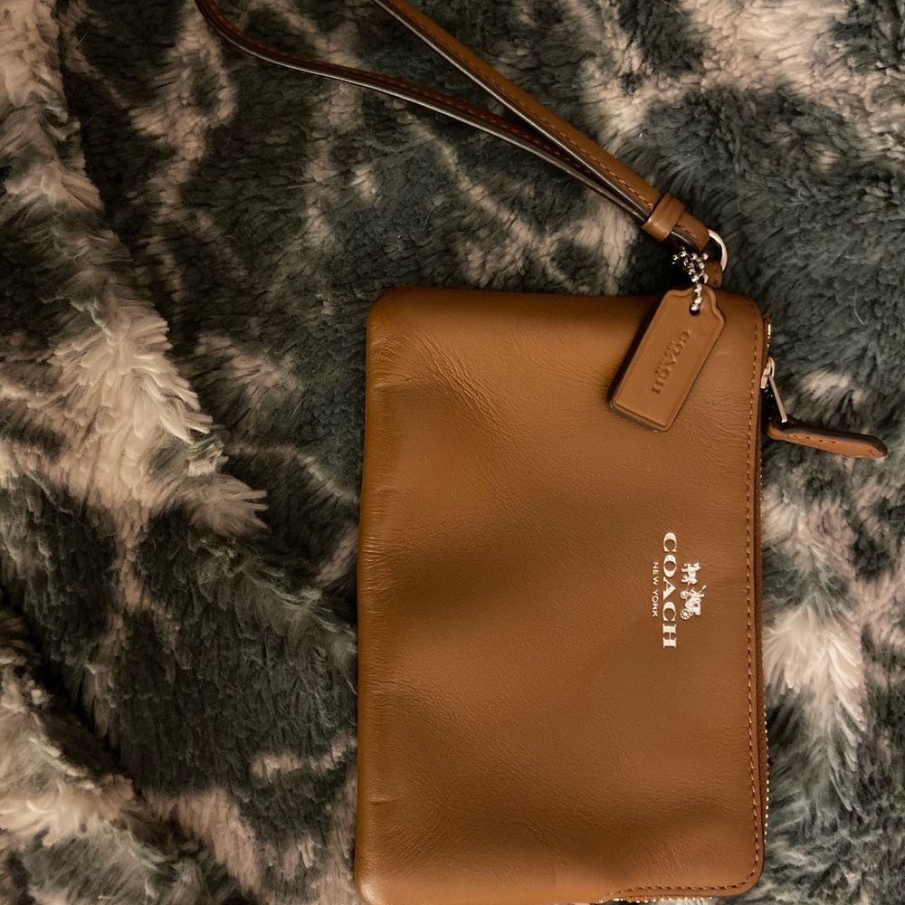 small light brown wristlet